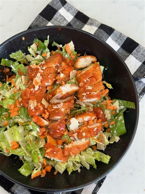 How does Buffalo Chicken Caesar Salad fit into your Daily Goals - calories, carbs, nutrition