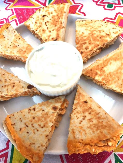 How does Buffalo Chicken Quesadilla with sour cream and salsa fit into your Daily Goals - calories, carbs, nutrition