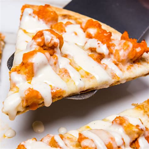 How does Buffalo Chicken Wheat Pizza fit into your Daily Goals - calories, carbs, nutrition