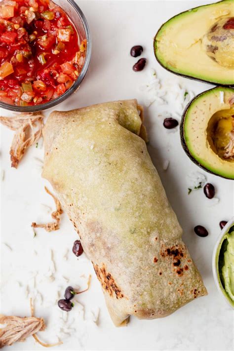 How does Burrito Gusto - Pork Carnitas fit into your Daily Goals - calories, carbs, nutrition