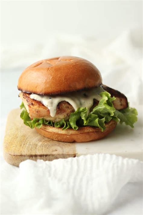 How does Caesar Grilled Chicken Breast Sandwich, on Roll fit into your Daily Goals - calories, carbs, nutrition