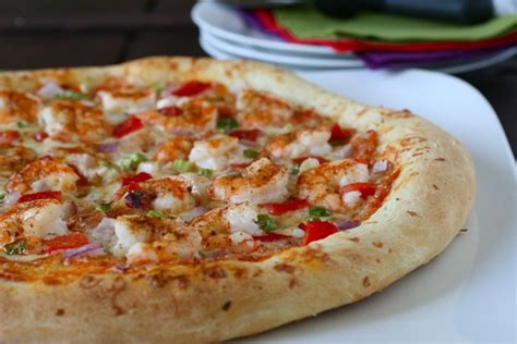 How does Cajun Pizza fit into your Daily Goals - calories, carbs, nutrition