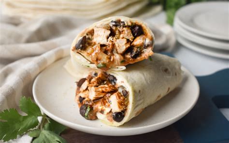 How does Caldo Chicken and Black Bean Burrito fit into your Daily Goals - calories, carbs, nutrition