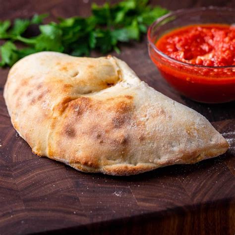 How does Calzone Cheese (Bison) fit into your Daily Goals - calories, carbs, nutrition