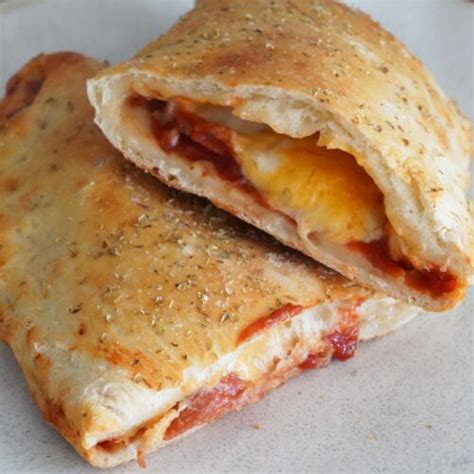 How does Calzone with Pepperoni and Mushrooms fit into your Daily Goals - calories, carbs, nutrition