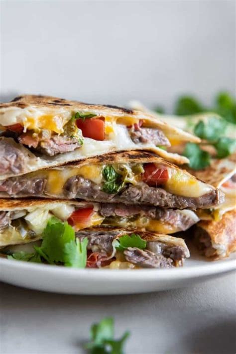 How does Carne Asada Quesadilla fit into your Daily Goals - calories, carbs, nutrition