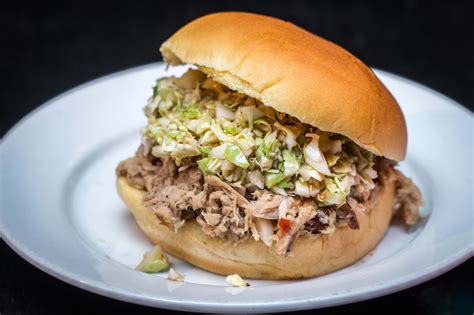 How does Carolina BBQ Pulled Pork Sandwich fit into your Daily Goals - calories, carbs, nutrition