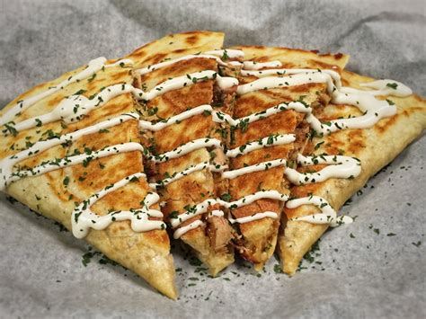 How does Carolina BBQ Smoked Chicken Quesadilla fit into your Daily Goals - calories, carbs, nutrition