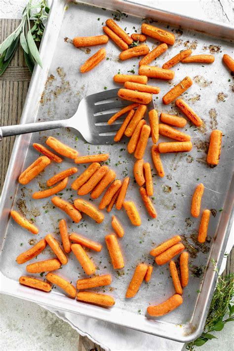 How does Carrots Simply Roasted 1/2 Cup fit into your Daily Goals - calories, carbs, nutrition