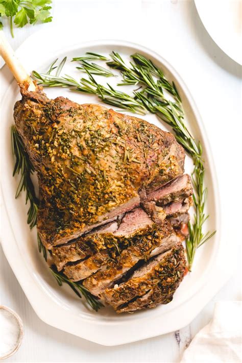 How does Carved Dijon Herb Roasted Leg of Lamb Platter fit into your Daily Goals - calories, carbs, nutrition