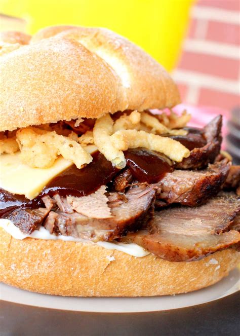 How does Carved Smoked BBQ Brisket Sandwich Platter fit into your Daily Goals - calories, carbs, nutrition