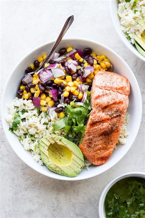 How does Cauliflower Rice Bowl with Orange Cilantro Salmon fit into your Daily Goals - calories, carbs, nutrition