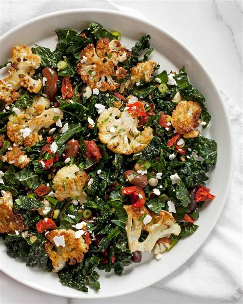 How does Cayenne Roasted Cauliflower, Kale and Chicken Box Salad fit into your Daily Goals - calories, carbs, nutrition