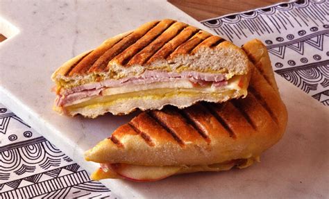 How does Cheddar, Ham and Apple Panini fit into your Daily Goals - calories, carbs, nutrition