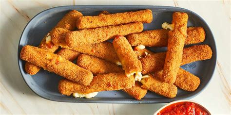 How does Cheese Mozzarella Sticks Fried 4 oz fit into your Daily Goals - calories, carbs, nutrition