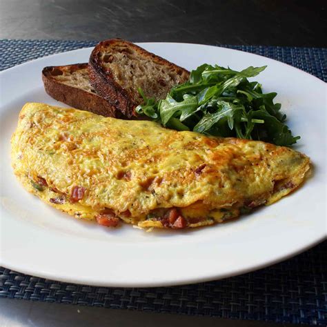 How does Cheese Omelet with Toast fit into your Daily Goals - calories, carbs, nutrition