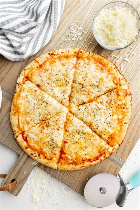 How does Cheese Pizza - 1 fit into your Daily Goals - calories, carbs, nutrition