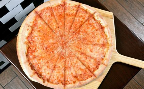 How does Cheese Pizza - 6 slices per pie fit into your Daily Goals - calories, carbs, nutrition