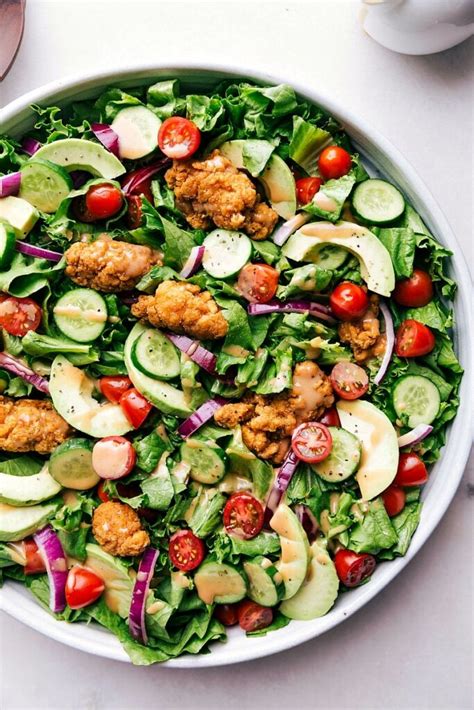 How does Chick-N-Strip Salad fit into your Daily Goals - calories, carbs, nutrition