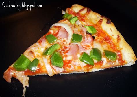 How does Chicken, Ham and Green Pepper Pizza Slice fit into your Daily Goals - calories, carbs, nutrition