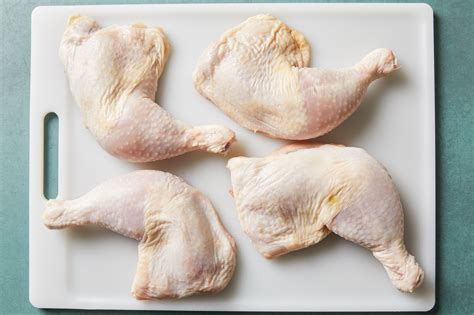 How does Chicken, skin (drumsticks and thighs), enhanced, raw fit into your Daily Goals - calories, carbs, nutrition