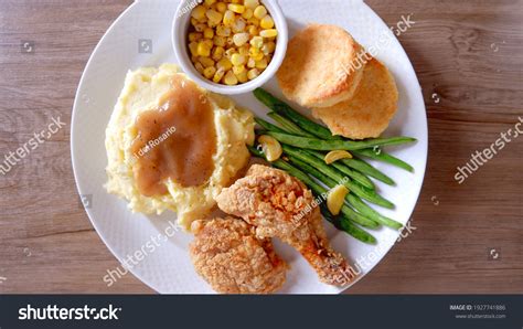 How does Chicken Biscuit with Mashed Potatoes fit into your Daily Goals - calories, carbs, nutrition