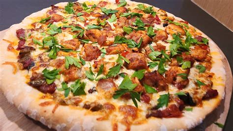 How does Chicken Cacciatore Pizza fit into your Daily Goals - calories, carbs, nutrition