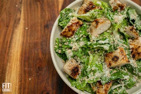 How does Chicken Caesar Salad 9 oz fit into your Daily Goals - calories, carbs, nutrition