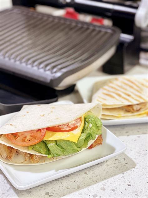 How does Chicken Club Panini fit into your Daily Goals - calories, carbs, nutrition