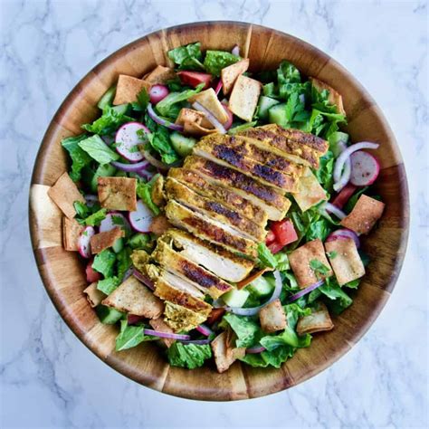 How does Chicken Fattoush Salad fit into your Daily Goals - calories, carbs, nutrition