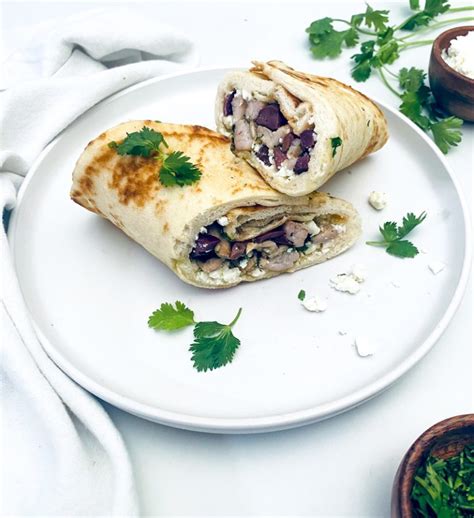 How does Chicken Feta Wrap fit into your Daily Goals - calories, carbs, nutrition