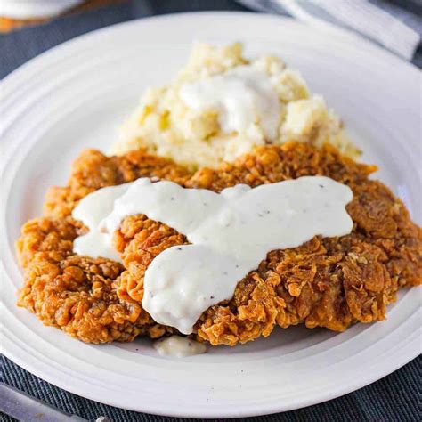 How does Chicken Fried Steak, with Smashed Potatoes Broccoli with Red Pepper fit into your Daily Goals - calories, carbs, nutrition