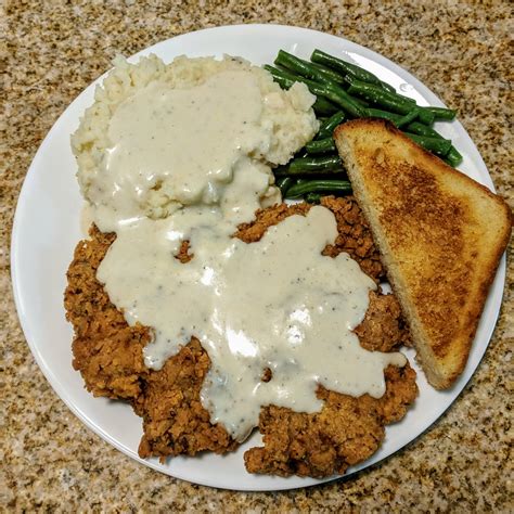 How does Chicken Fried Steak, with Smashed Potatoes Green Beans fit into your Daily Goals - calories, carbs, nutrition