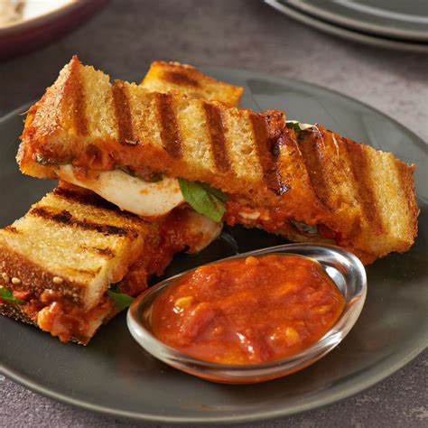 How does Chicken Margharita Panini Wrap fit into your Daily Goals - calories, carbs, nutrition