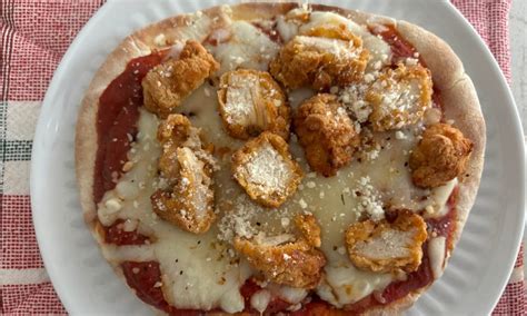 How does Chicken Parmesan Pizza fit into your Daily Goals - calories, carbs, nutrition