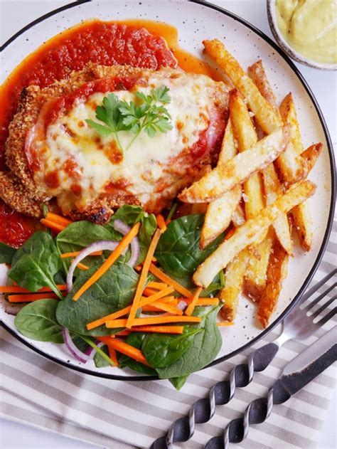 How does Chicken Parmigiana Press-atta fit into your Daily Goals - calories, carbs, nutrition