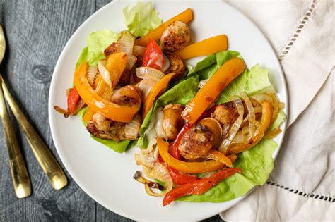 How does Chicken Sausage Lettuce Cups with Sriracha Aioli fit into your Daily Goals - calories, carbs, nutrition