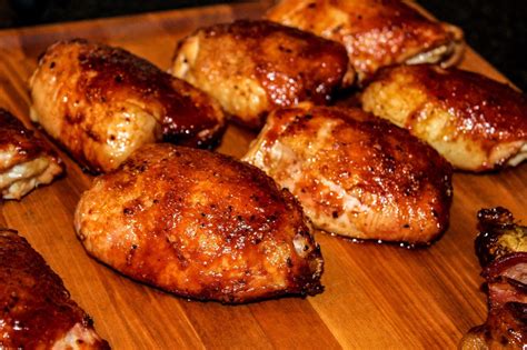 How does Chicken Thigh Pulled Smoked 4 oz fit into your Daily Goals - calories, carbs, nutrition