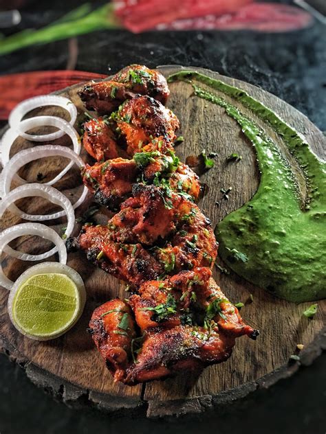 How does Chicken Tikka Skewer with Mint & Cucmuber fit into your Daily Goals - calories, carbs, nutrition