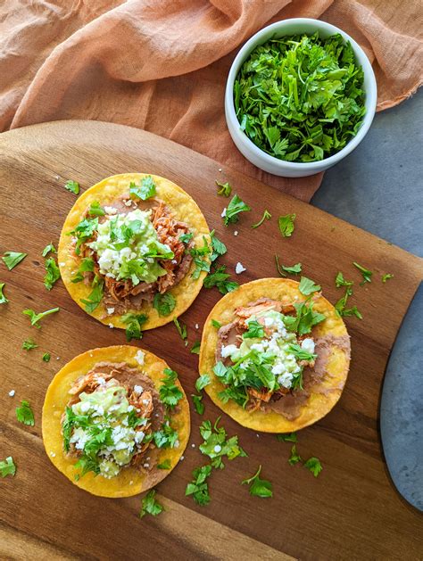 How does Chicken Tinga Tostadas fit into your Daily Goals - calories, carbs, nutrition