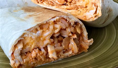 How does Chicken Tinga and Cheese Burrito fit into your Daily Goals - calories, carbs, nutrition