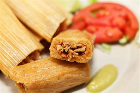 How does Chicken and Cheese Tamales fit into your Daily Goals - calories, carbs, nutrition