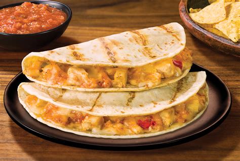 How does Chicken and Monterey Jack Cheese Burrito fit into your Daily Goals - calories, carbs, nutrition