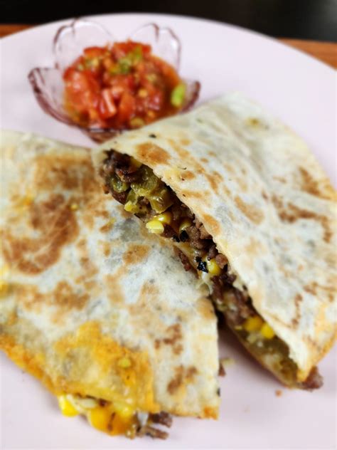 How does Chili Cheese Quesadillas with Salsa Cruda fit into your Daily Goals - calories, carbs, nutrition