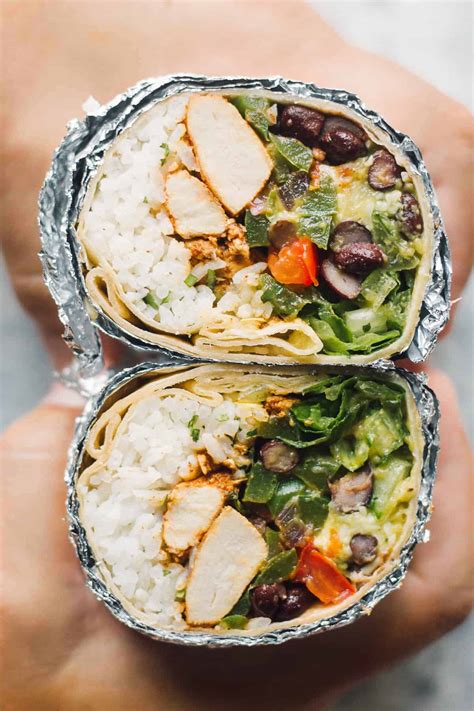 How does Chipotle - Chicken Burrito (With White Rice & Cheese) fit into your Daily Goals - calories, carbs, nutrition