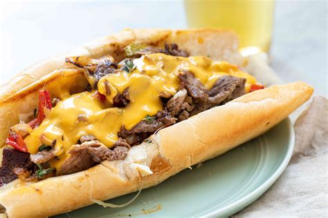 How does Chipotle Philly Cheese Steak Sandwich fit into your Daily Goals - calories, carbs, nutrition