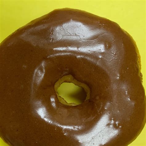 How does Chocolate Raised Donut fit into your Daily Goals - calories, carbs, nutrition