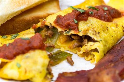 How does Chorizo Omelet with Chile Sauce fit into your Daily Goals - calories, carbs, nutrition
