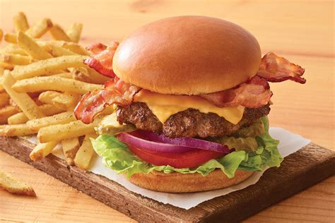 How does Classic Bacon Cheeseburger 4 oz fit into your Daily Goals - calories, carbs, nutrition