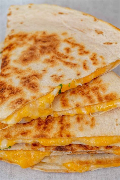 How does Classic Cheese Quesadilla fit into your Daily Goals - calories, carbs, nutrition